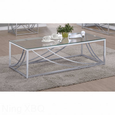 Table basse en verre avec pieds en métal chromé