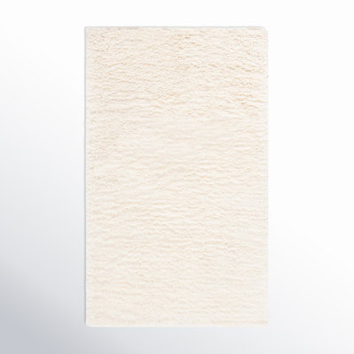 Abriel Ivory Solid Hand-Woven Wool Rug
