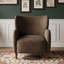 Fauteuil club à oreilles rembourré
