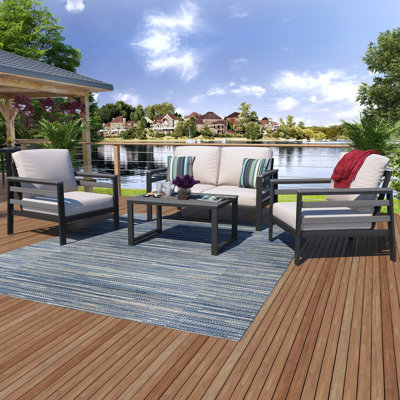 Townsend 4 - Person Outdoor Seating Group with Sunbrella Cushions