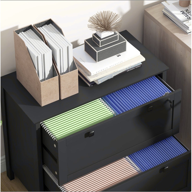 Black 2 Drawer File Cabinet For Home Office. Secure With Lock. Fits Different Sizes. Functional And Stylish. -Coated Particleboard Build. 31.1" L X 15.7" W 28.3" H. 132 Lbs Capacity. Assembly