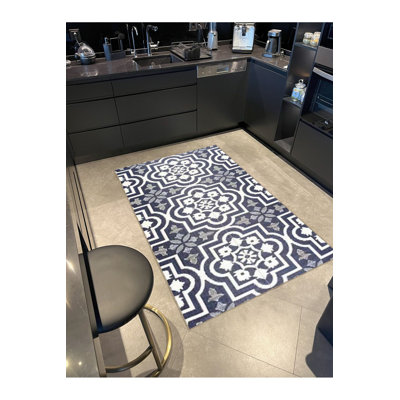 Tapis décoratif bleu marine à motif traditionnel