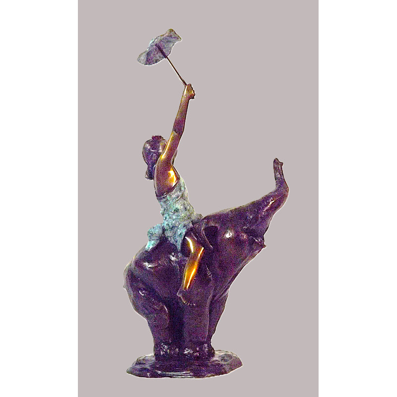 Girl on elephant