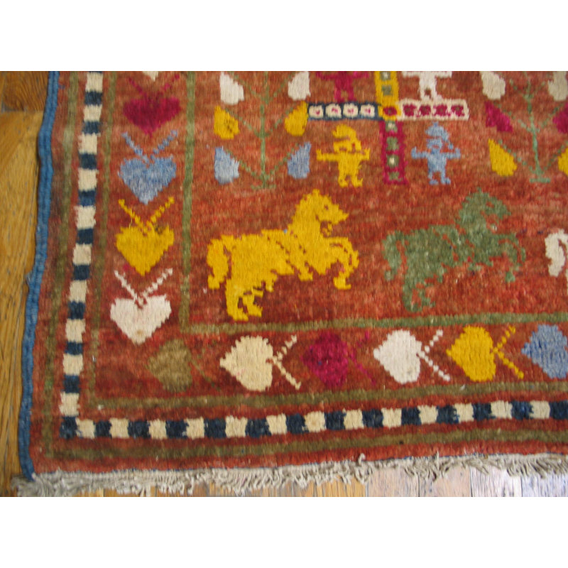 Tapis indien antique à motif animalier et géométrique