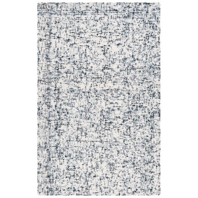 Gelissa Abstract Hand Tufted Wool/Cotton Abstract Rug in Ivory/Black