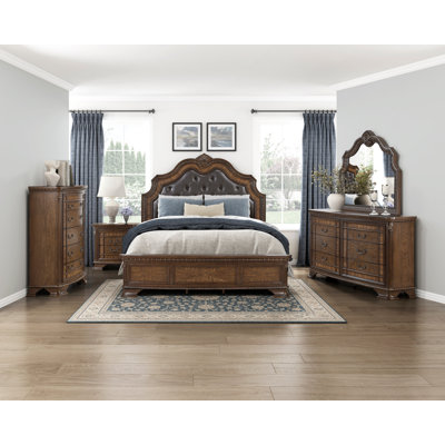 Gullbrand Traditional Faux Leather Upholstered Bed with Tufted Headboard and Carved Molding