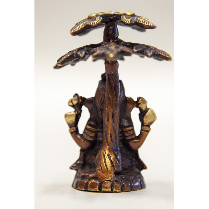 Ganesha assis sous un arbre