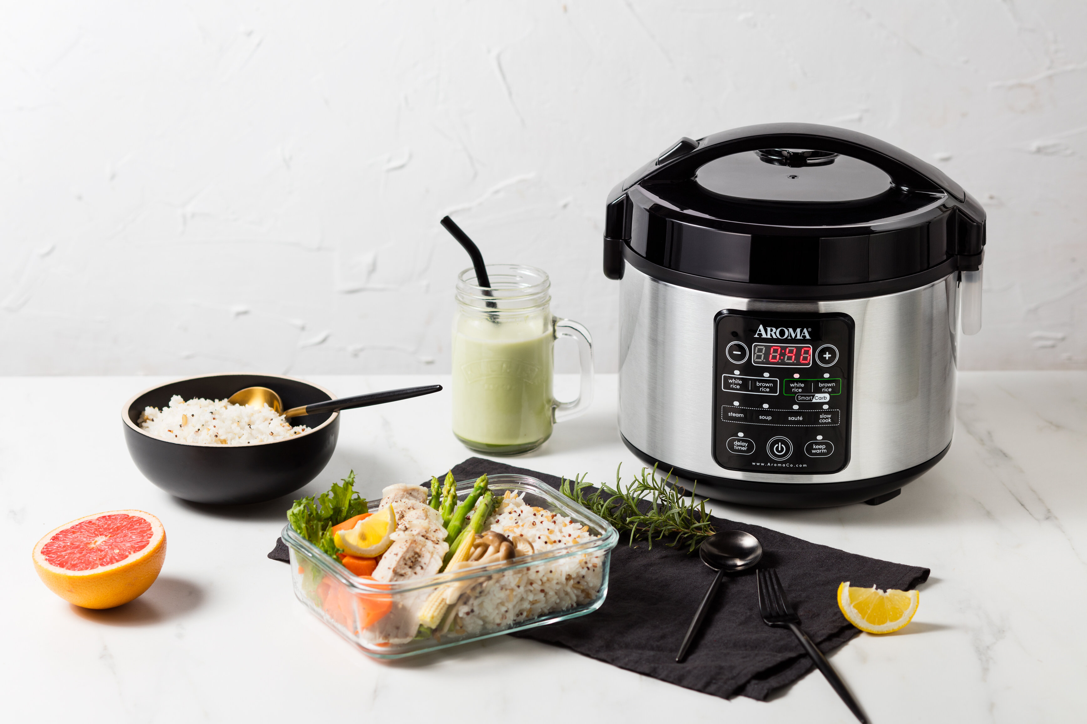 https://assets.wfcdn.com/im/27747359/compr-r85/9473/94734312/aroma-12-cup-cool-touch-cooked-smartcarb-multi-cooker.jpg