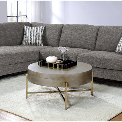 Table basse brun clair et champagne