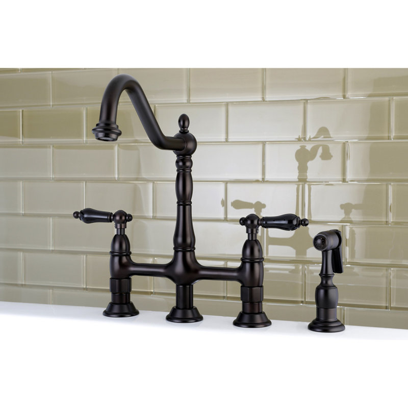 Kingston Brass Duchess Two-Handle 4-Hole Deck Mount Bridge Kitchen Faucet with Brass Side Sprayer, Oil Rubbed Bronze