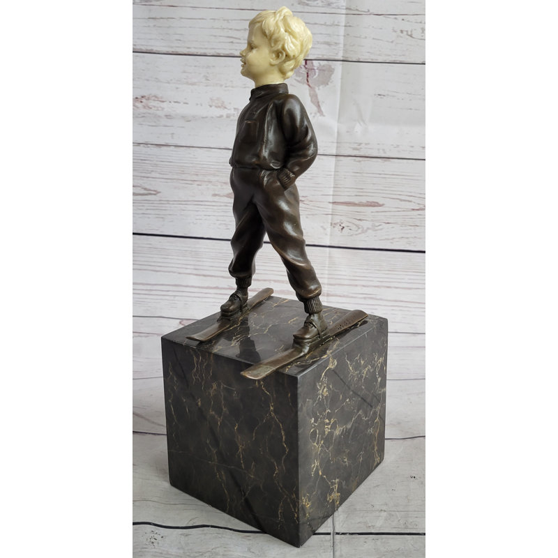 Sculpture en fonte de saut à ski