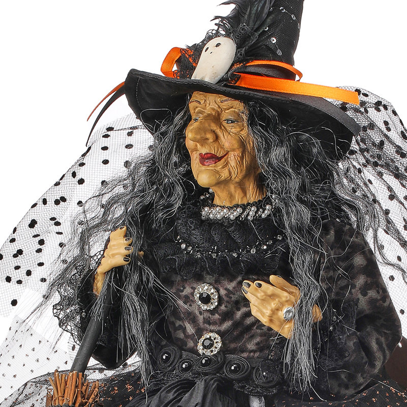 25 po sorcière d'Halloween assise