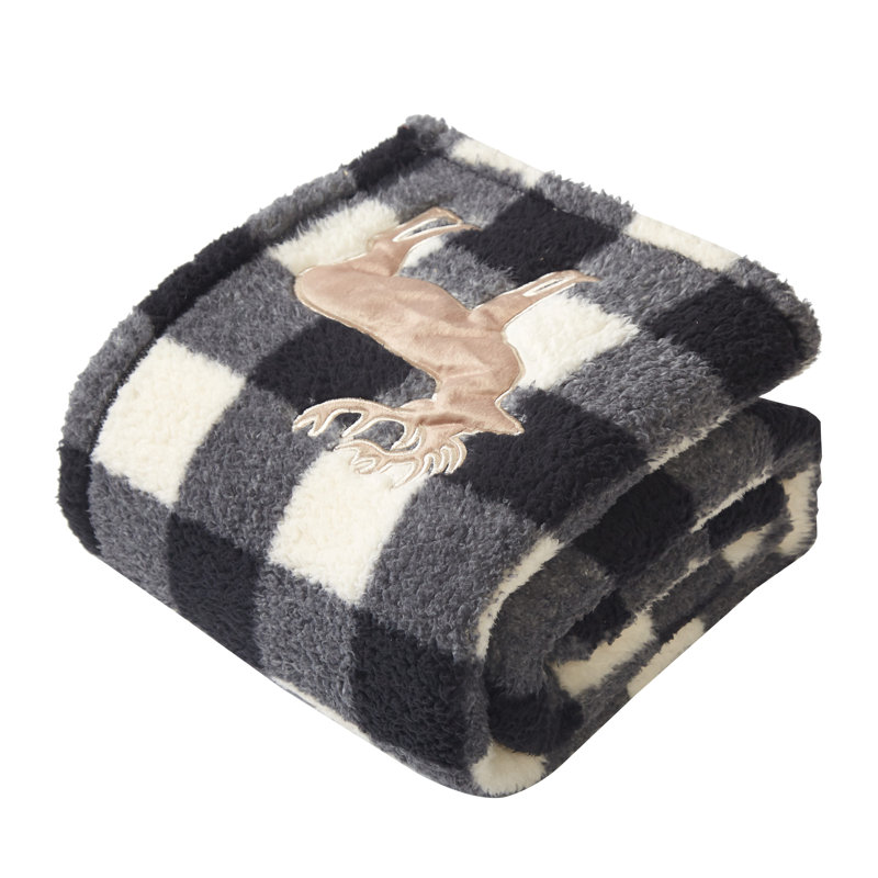 Jeté en sherpa à motif écossais noir et blanc