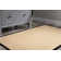 Nannette Handmade Light Beige Berber with Black Faux Leather Border Area Rug
