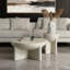 Table basse ronde moderne en faux marbre avec piètement sculptural - 39 cm de large