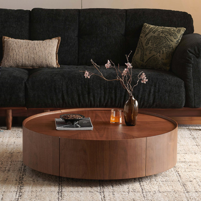 Table basse ronde avec grain de bois de noyer et base en fer