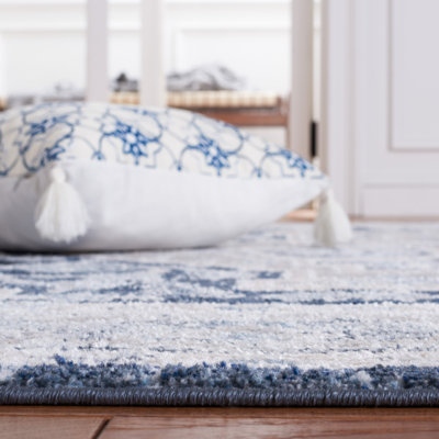 Arora Washable 210 Area Rug In Beige / Navy