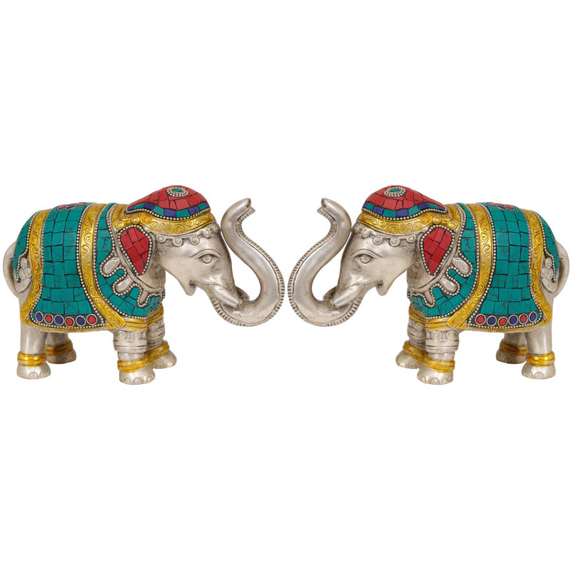 Paire d'éléphants avec des troncs surélevés