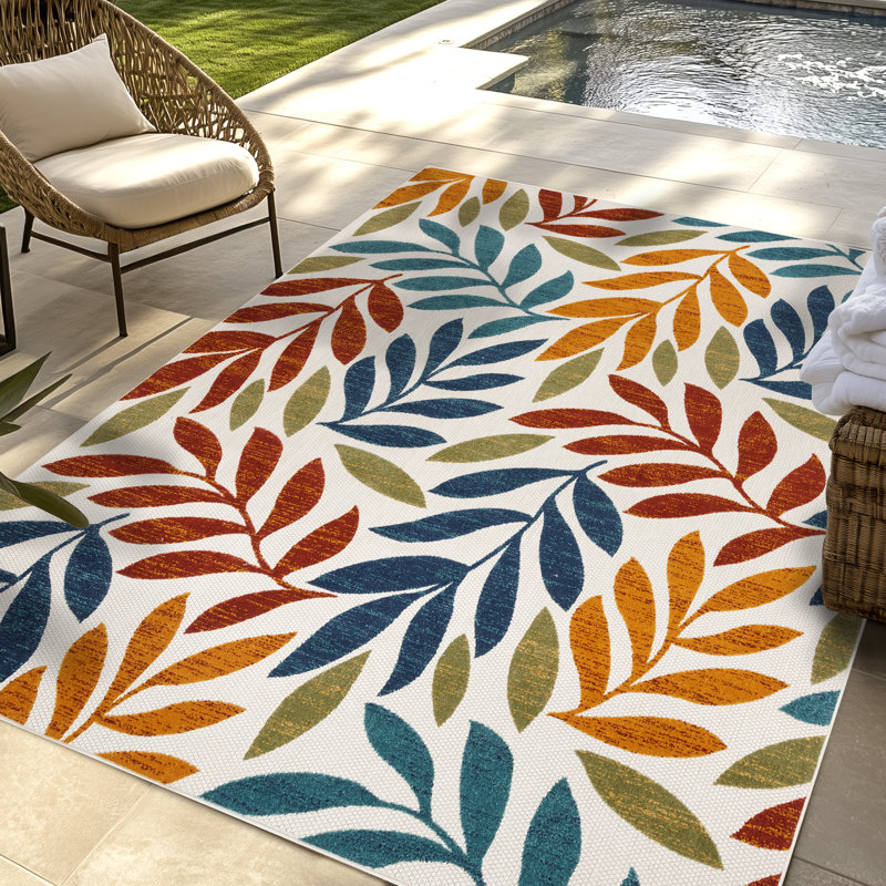 Tapis intérieur / extérieur multicolore à motif de feuilles en polypropylène tissé à plat et à motif à tissage plat