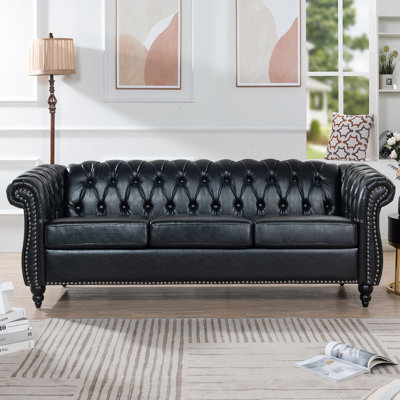 PU Rolled Arm Chesterfield Three Seater Sofa.