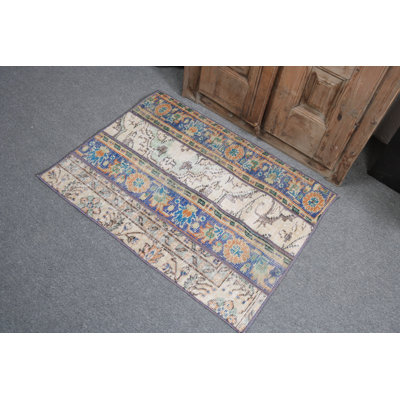 Charming Small Turkish Antique Patchwork Rug with Hint of Blue for Kitchens and Living Spaces