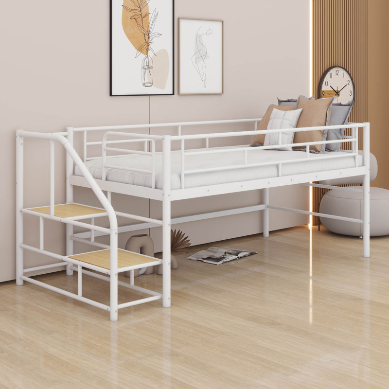 Maximisez l'espace au sol avec un lit mezzanine simple, des escaliers de rangement intégrés et une structure en métal robuste