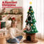 Arbre à chat de Noël de 168 cm avec 2 niches confortables, tour à chat d'intérieur moderne, système anti-basculement, poteaux à griffer recouverts de sisal, perchoirs moelleux et balles suspendues, arbre à chat festif idéal pour que les chatons puissent jouer et dormir.