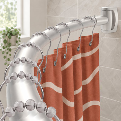 Cette tringle de douche incurvée ronde en nickel brossé utilise une conception d'épissure réglable de 33 à 78 pouces; La fabrication en acier inoxydable antirouille convient aux salles de bain et nécessite un perçage.