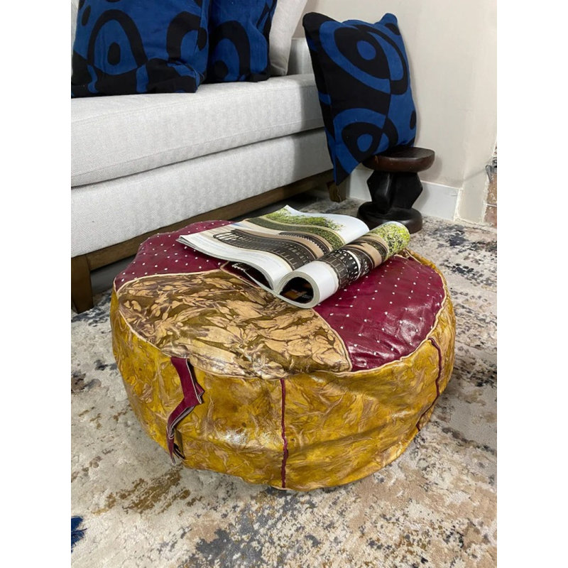 Pouf rond en cuir véritable Conswello