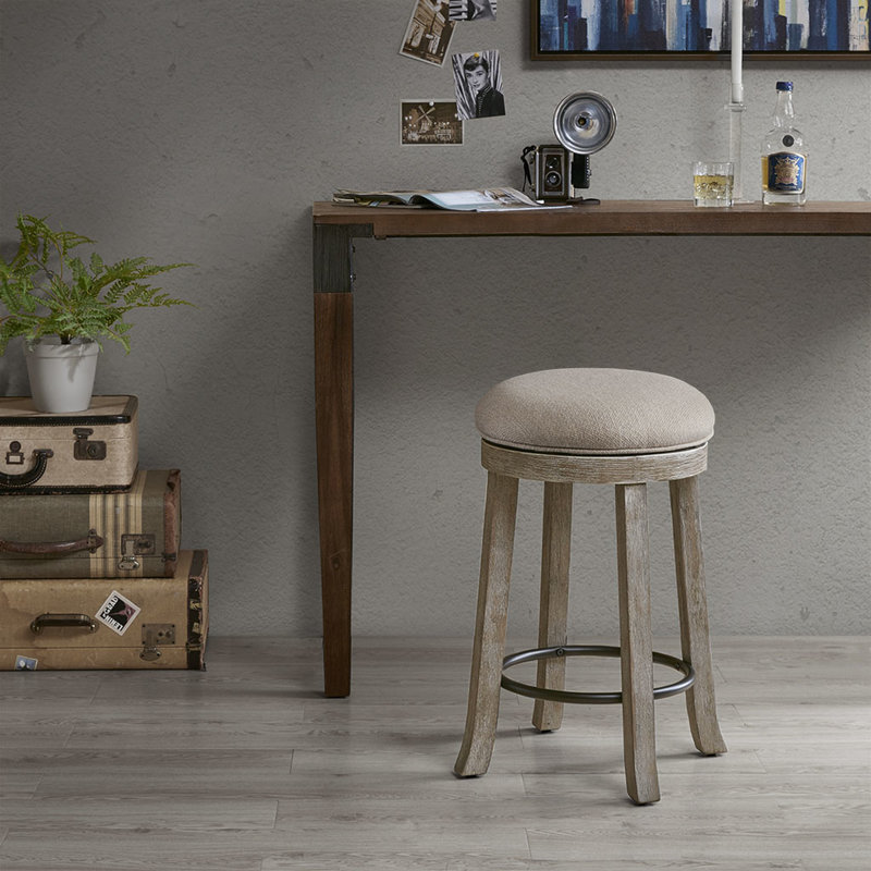 Tabouret de comptoir rembourré texturé gris avec fonction pivotante et siège légèrement patiné, revêtement rotatif à 360 degrés et métal