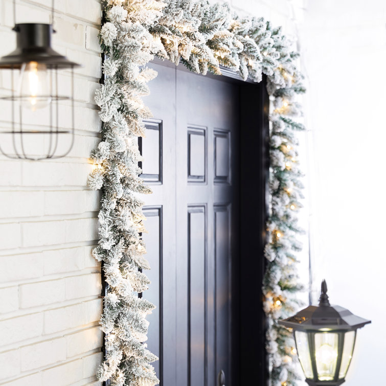 https://assets.wfcdn.com/im/27837073/resize-h755-w755%5Ecompr-r85/2265/226587787/Ernberg+9ft+Flocked+Christmas+Garland+with+LED+Lights.jpg