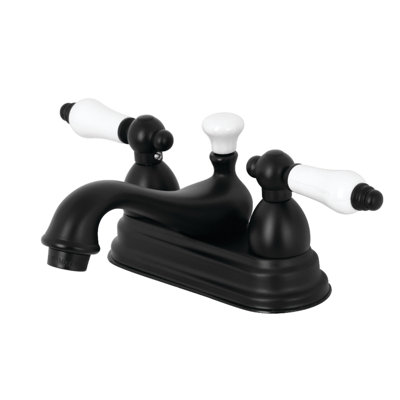 Kingston Brass Restoration Two-Handle 3-Hole Deck Mount 4" Centerset Bathroom Faucet with Brass Pop-Up