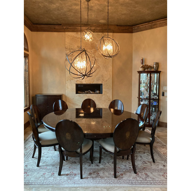 Grande table de salle à manger extensible ronde avec armoires de rangement à feuilles et à abattants pouvant accueillir confortablement dix personnes