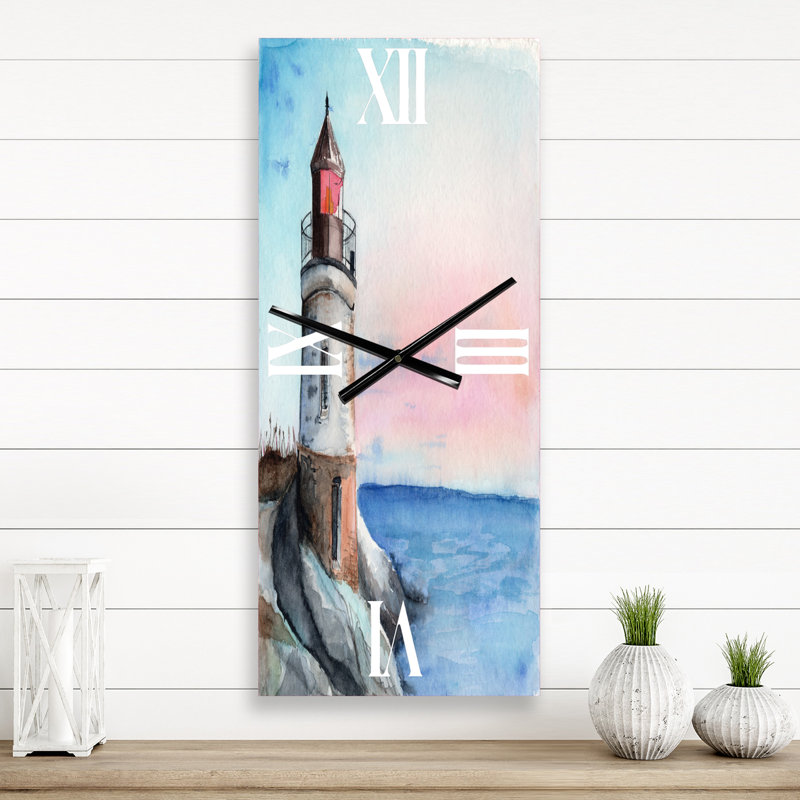 Un phare sur un rivage en début de matinée - horloge murale nautique et côtière, Grand