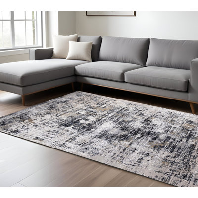 Tapis abstrait gris et blanc 7 pi x 10 pi beige