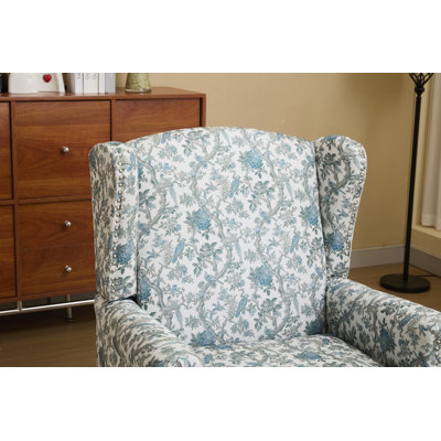 Fauteuil à oreilles moderne avec motif floral et pieds en bois massif