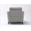 Fauteuil capitonné en tissu gris clair
