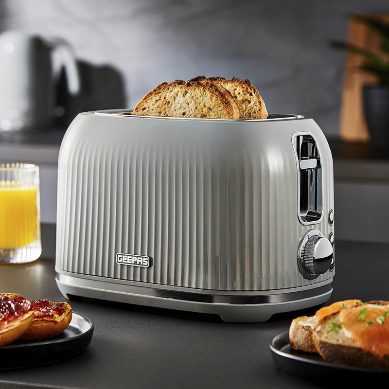 GEEPAS Fluted 2 Slice Toaster | 6 Browning Levels Cancel Defrost Reheat | For Thin Small Bread Slice Removable Crumb Tray Cool Touch Housing High Lift | Space-Saving Design | 2 Yr Warranty 1000W