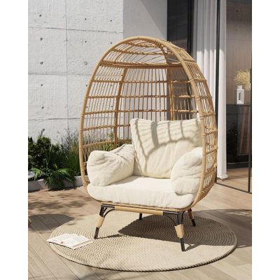 Fauteuil surdimensionné en rotin d'œuf avec coussins, panier en PE imperméable et résistant aux rayons UV pour une utilisation intérieure / extérieure