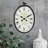 Scriber Oval Metal Wall Clock with Bird