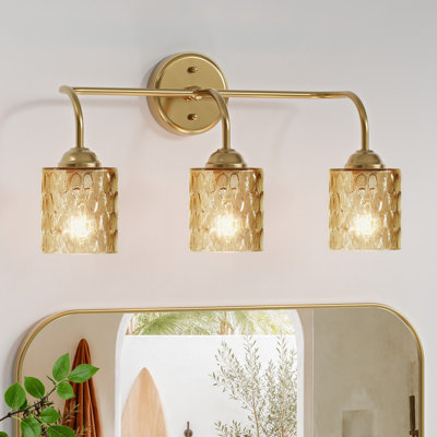 Applique murale à 3 lumières de 53 cm (21 po) en or brossé avec abat-jour en verre ambré texturé