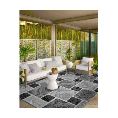 Tapis lavable noir à motif géométrique à motif géométrique