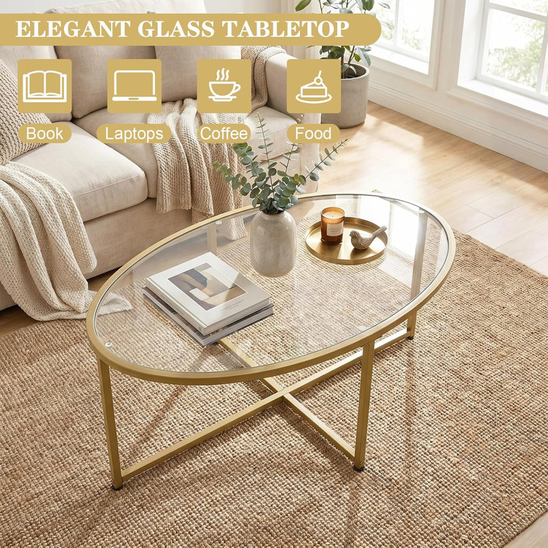Table basse ovale en verre doré