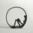 Krahn Encircled Reader Iron Figurine
