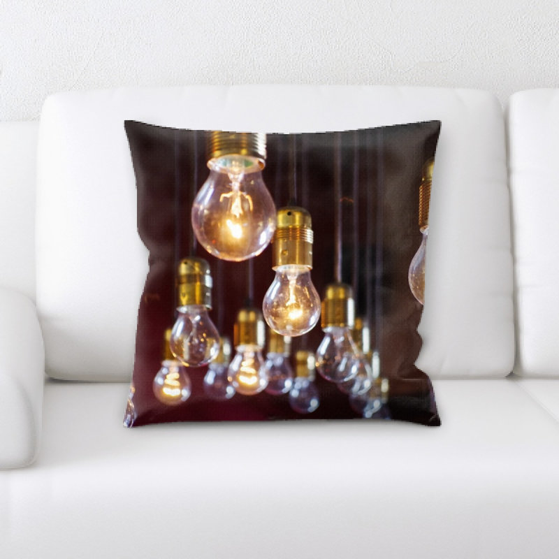 Coussin décoratif ampoules claires