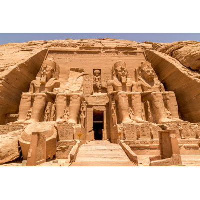Statues In Front Of Abu Simbel Temple In Aswan Egypt by Nodostudio - Wrapped Canvas Print