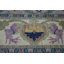 Tapis bleu à motif végétal