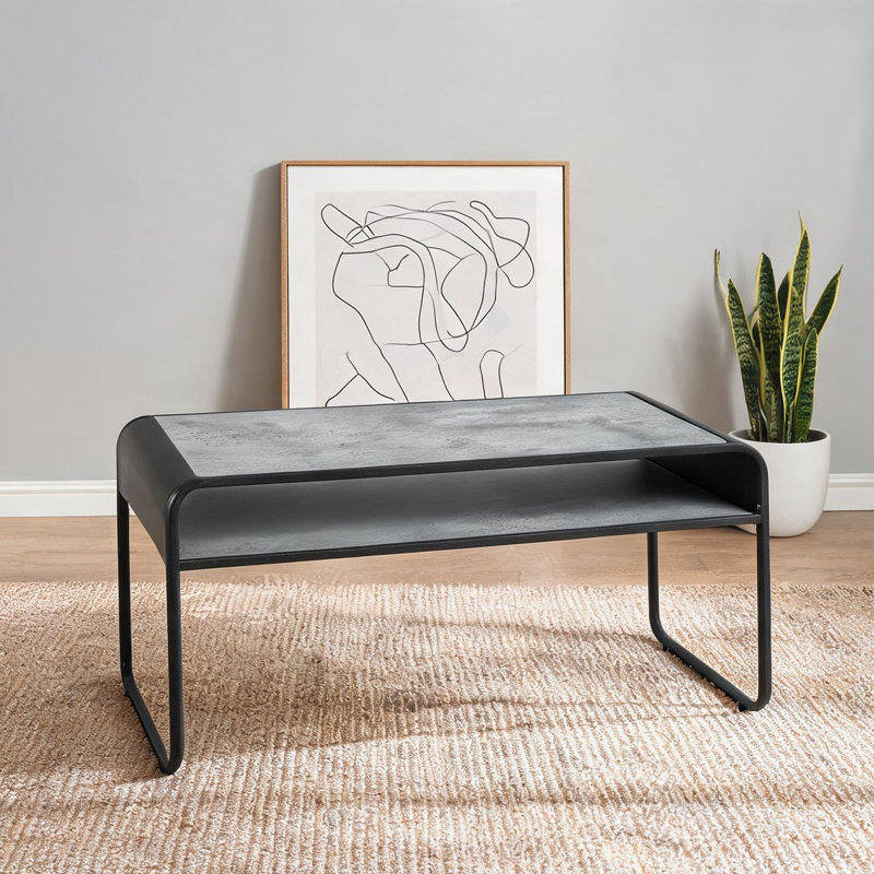 Table basse avec plateau d'aspect béton, gris ardoise et noir, structure rectangulaire compacte - Conception moderne peu encombrante