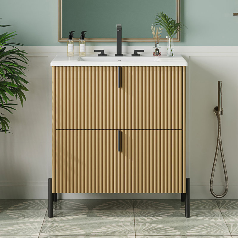 Meuble-lavabo de salle de bain avec lavabo en céramique, équipé de poignées verticales et de tiroirs pleine extension