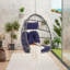 Chaise suspendue d'extérieur bleu foncé, avec coussin confortable et matériaux bleu moderne, structure facile d'entretien